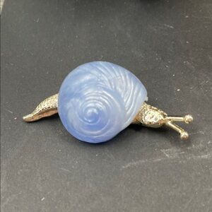 2.7.26-14 Blue Lucite Shell & Goldtone Snail Brooch (2.25”)